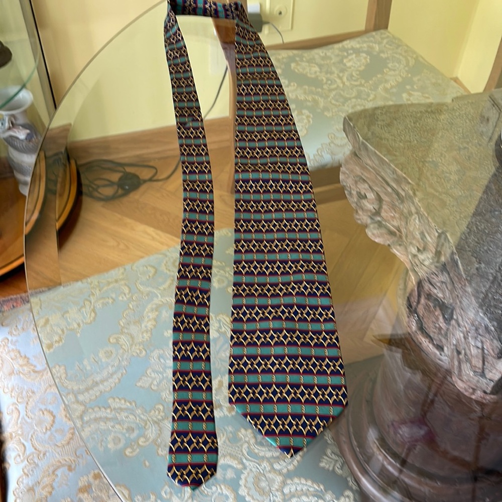 Paola designed by Paola/ Gucci Tie.